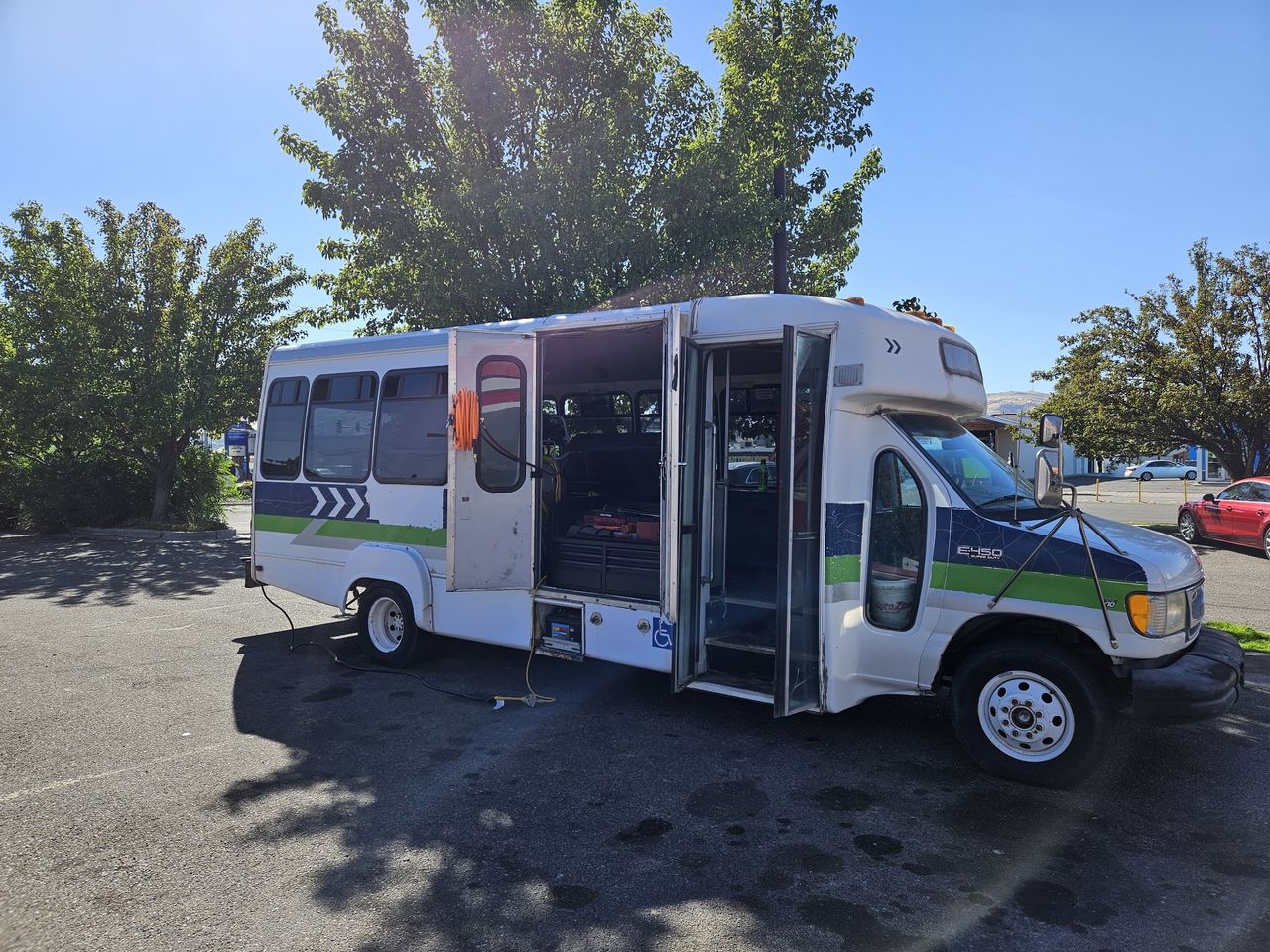 Wolf Pack Repair&rsquo;s mobile workshop van with its side doors open, showing the tool chest carried to every job